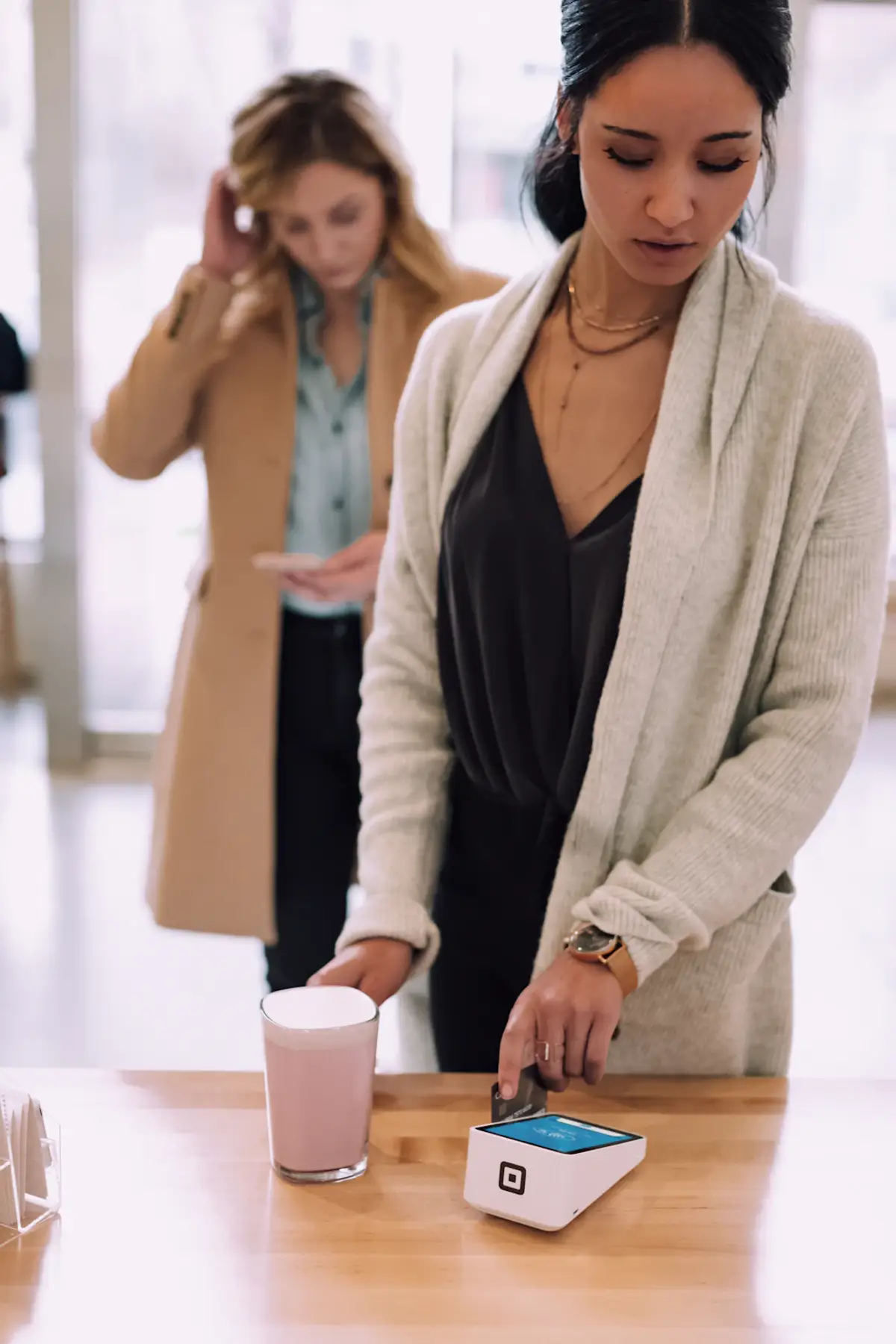 woman using white device